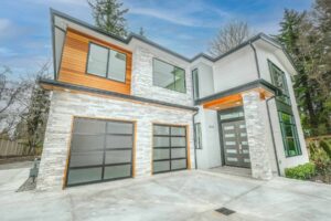 Illustration of new construction home with two garage doors and multi level