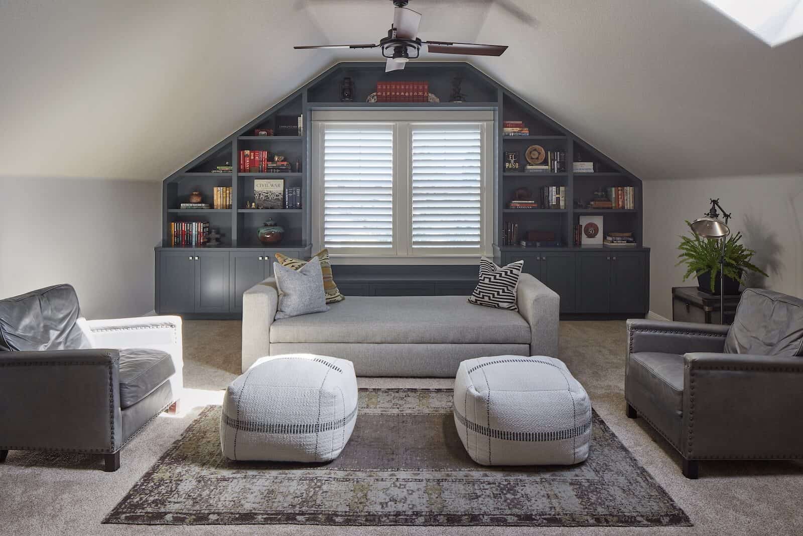 Bonus room with built in book cases, carpet and furniture